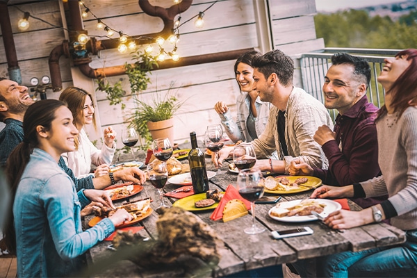 a group of millennials eating together