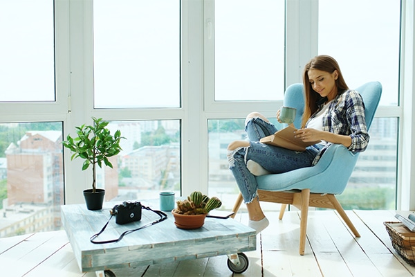 a woman relaxing in her apartment