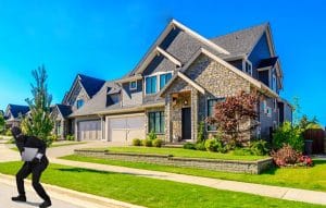 a criminal outside of a house