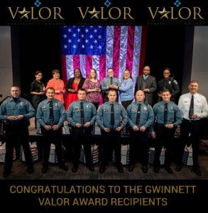 VALOR-2021 an EMC security sign in front of a house